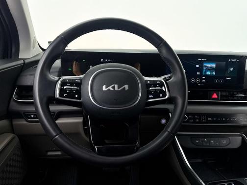 Aurora Black Pearl 2025 Kia Carnival Hybrid EX