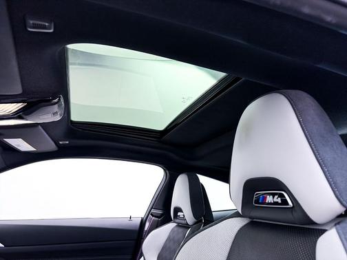 Black Sapphire Metallic 2023 BMW M4 Competition xDrive