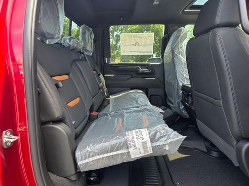 Volcanic Red Tintcoat 2026 GMC Sierra 3500 AT4