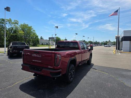 Volcanic Red Tintcoat 2026 GMC Sierra 3500 AT4