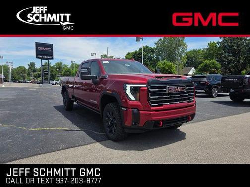 Volcanic Red Tintcoat 2026 GMC Sierra 3500 AT4