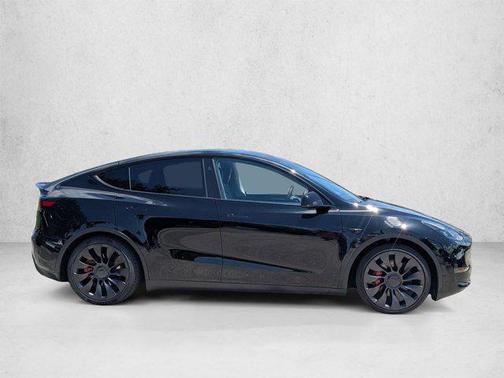 Solid Black 2025 Tesla Model Y Performance Dual Motor All-Wheel Drive