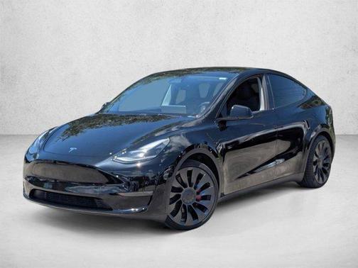 Solid Black 2025 Tesla Model Y Performance Dual Motor All-Wheel Drive