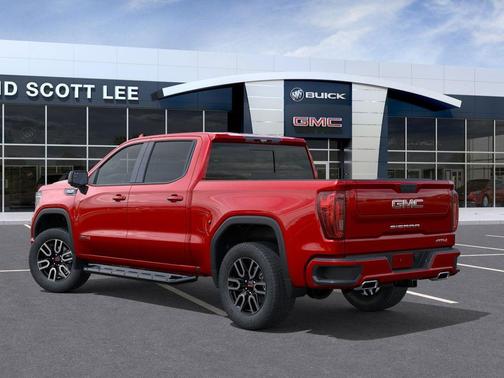 Volcanic Red Tintcoat 2026 GMC Sierra 1500 AT4
