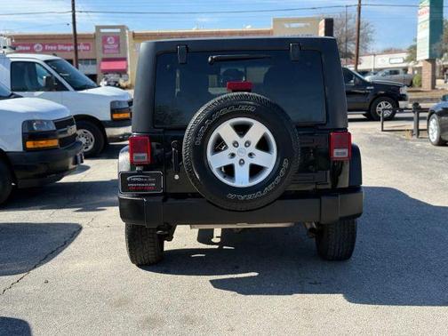 Black 2012 Jeep Wrangler Unlimited Sport
