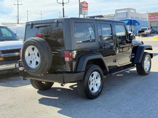 Black 2012 Jeep Wrangler Unlimited Sport
