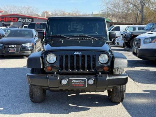 Black 2012 Jeep Wrangler Unlimited Sport