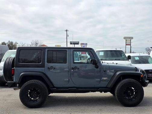 Gray 2015 Jeep Wrangler Unlimited Sahara