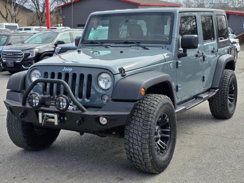 Gray 2015 Jeep Wrangler Unlimited Sahara