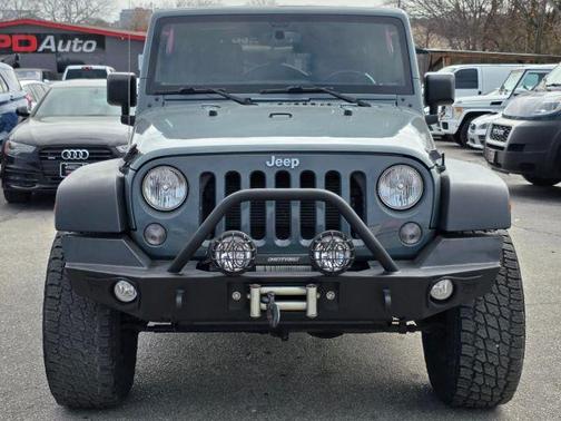Gray 2015 Jeep Wrangler Unlimited Sahara