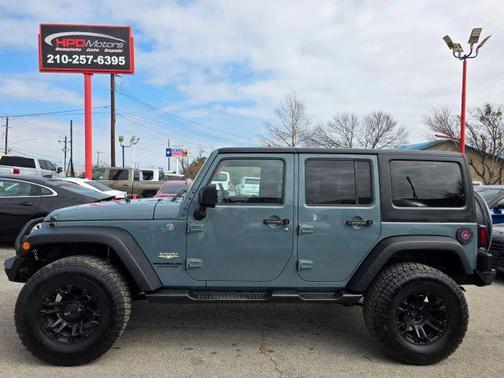 Gray 2015 Jeep Wrangler Unlimited Sahara