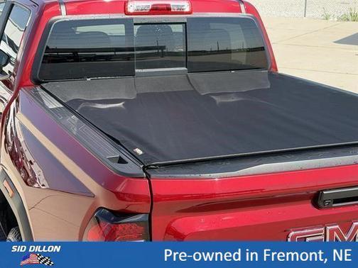 Volcanic Red Tintcoat 2024 GMC Canyon AT4