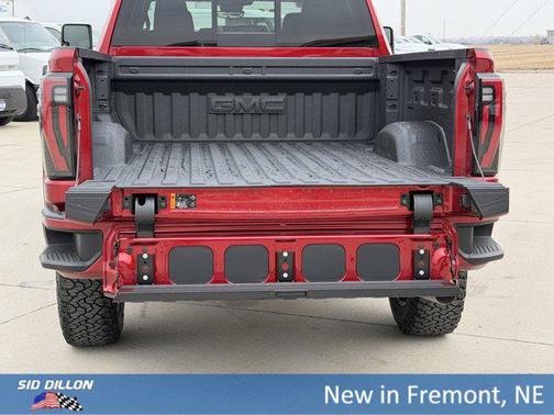 Volcanic Red Tintcoat 2026 GMC Sierra 2500 AT4