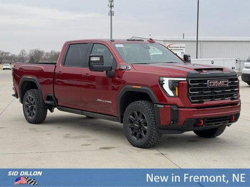 Volcanic Red Tintcoat 2026 GMC Sierra 2500 AT4