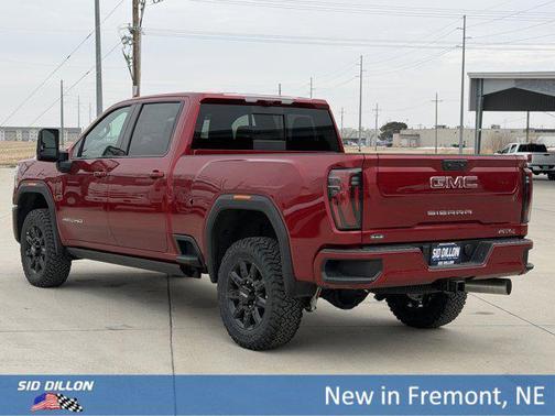 Volcanic Red Tintcoat 2026 GMC Sierra 2500 AT4