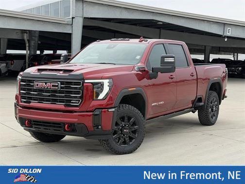 Volcanic Red Tintcoat 2026 GMC Sierra 2500 AT4