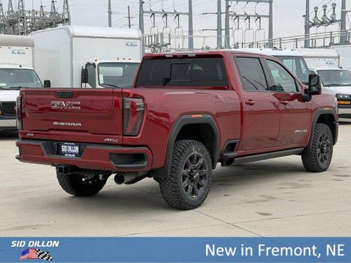 Volcanic Red Tintcoat 2026 GMC Sierra 2500 AT4