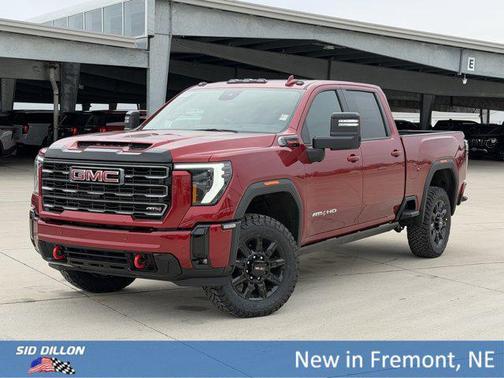 Volcanic Red Tintcoat 2026 GMC Sierra 2500 AT4