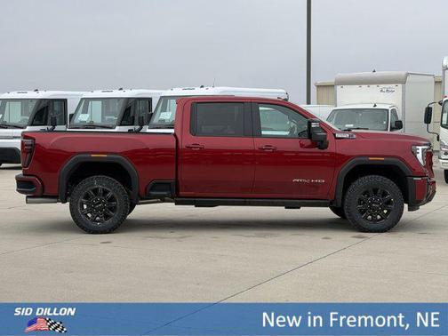 Volcanic Red Tintcoat 2026 GMC Sierra 2500 AT4