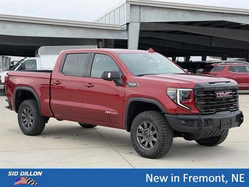 Volcanic Red Tintcoat 2026 GMC Sierra 1500 AT4X
