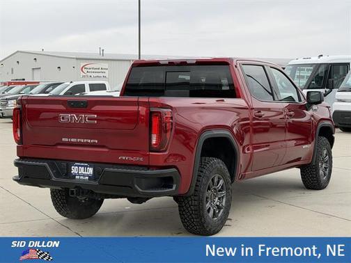 Volcanic Red Tintcoat 2026 GMC Sierra 1500 AT4X