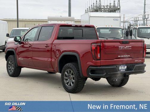 Volcanic Red Tintcoat 2026 GMC Sierra 1500 AT4X
