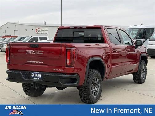 Volcanic Red Tintcoat 2026 GMC Sierra 1500 AT4X