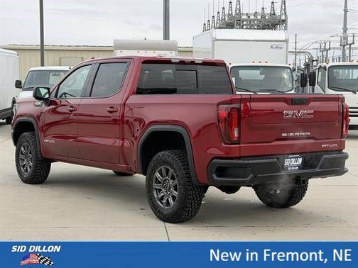 Volcanic Red Tintcoat 2026 GMC Sierra 1500 AT4X