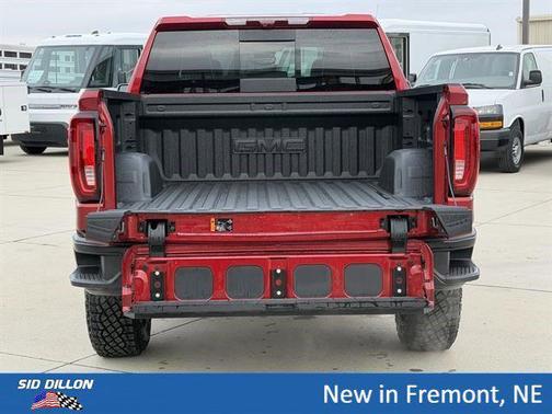 Volcanic Red Tintcoat 2026 GMC Sierra 1500 AT4X