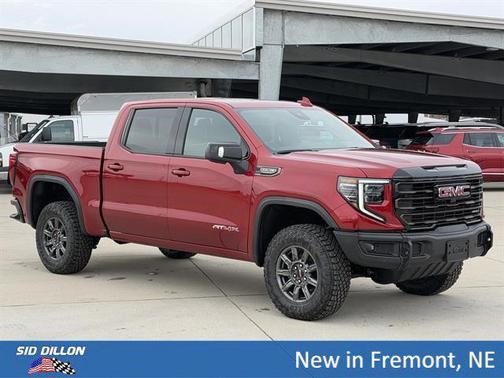 Volcanic Red Tintcoat 2026 GMC Sierra 1500 AT4X