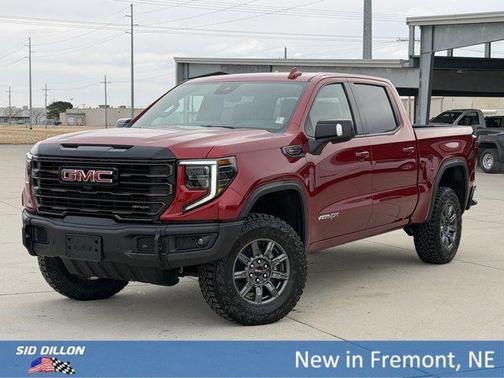 Volcanic Red Tintcoat 2026 GMC Sierra 1500 AT4X
