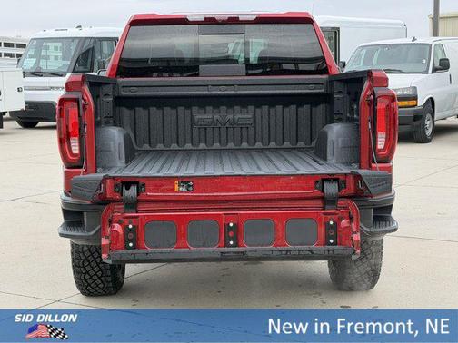 Volcanic Red Tintcoat 2026 GMC Sierra 1500 AT4X