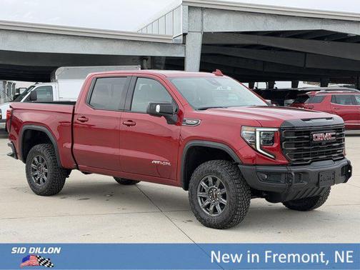 Volcanic Red Tintcoat 2026 GMC Sierra 1500 AT4X