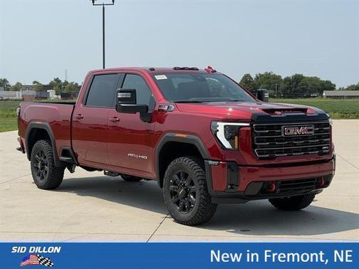 Volcanic Red Tintcoat 2026 GMC Sierra 2500 AT4