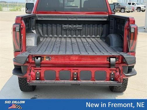 Volcanic Red Tintcoat 2026 GMC Sierra 2500 AT4