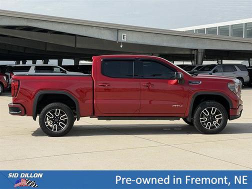 Volcanic Red Tintcoat 2025 GMC Sierra 1500 AT4