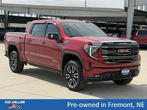 Volcanic Red Tintcoat 2025 GMC Sierra 1500 AT4