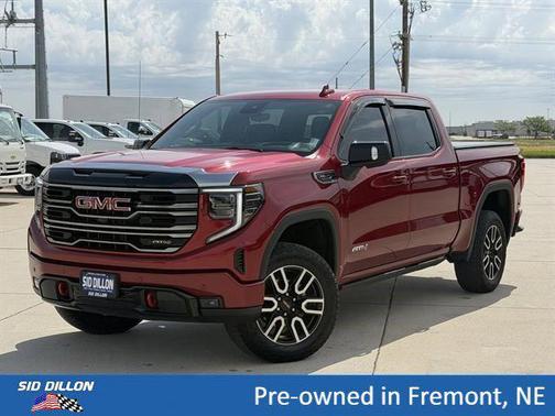 Volcanic Red Tintcoat 2025 GMC Sierra 1500 AT4