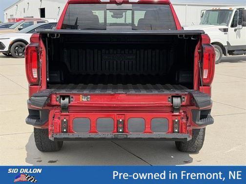 Volcanic Red Tintcoat 2025 GMC Sierra 1500 AT4