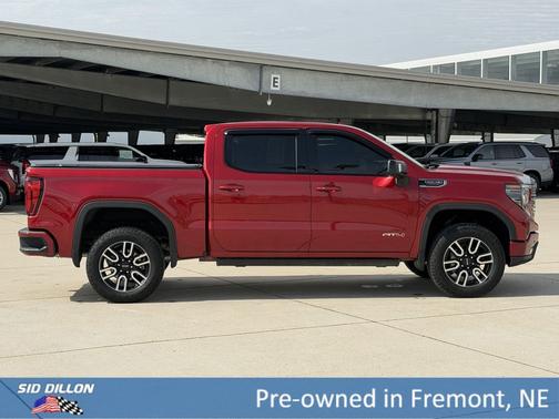 Volcanic Red Tintcoat 2025 GMC Sierra 1500 AT4