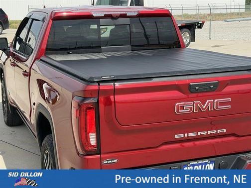 Volcanic Red Tintcoat 2025 GMC Sierra 1500 AT4