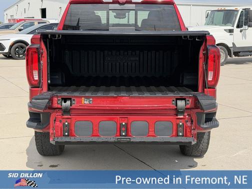 Volcanic Red Tintcoat 2025 GMC Sierra 1500 AT4
