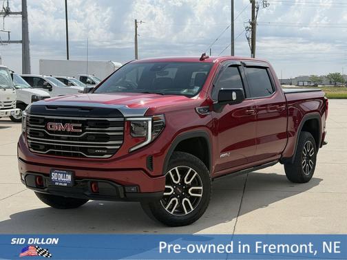 Volcanic Red Tintcoat 2025 GMC Sierra 1500 AT4