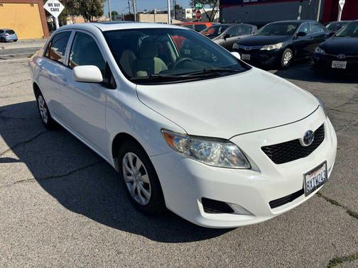 Super White 2010 Toyota Corolla 4dr Sdn Auto LE (Natl)