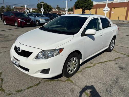 Super White 2010 Toyota Corolla 4dr Sdn Auto LE (Natl)
