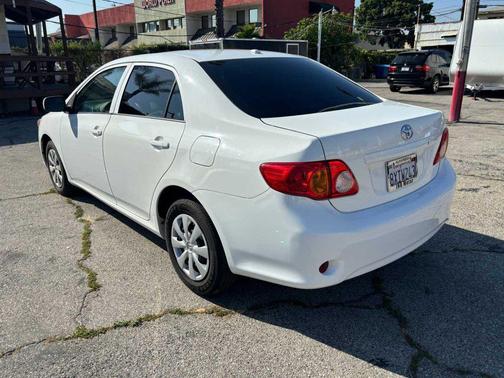 Super White 2010 Toyota Corolla 4dr Sdn Auto LE (Natl)