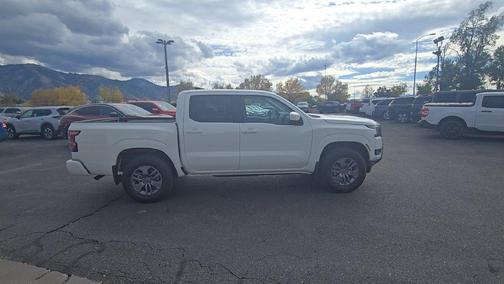 Glacier White 2025 Nissan Frontier SV