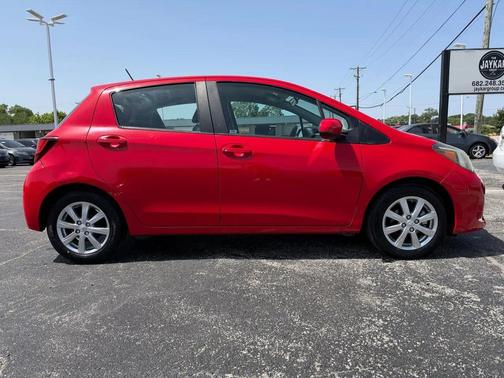 Absolutely Red 2015 Toyota Yaris LE