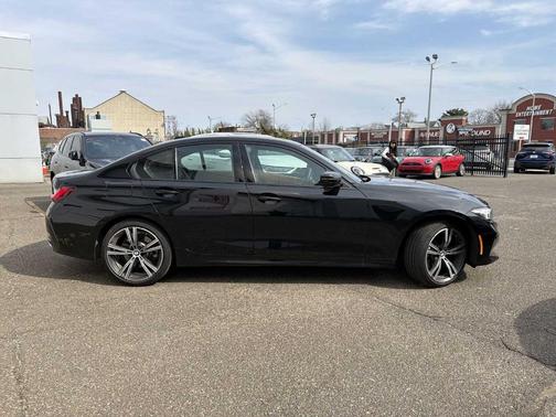 Jet Black 2023 BMW 330 i xDrive