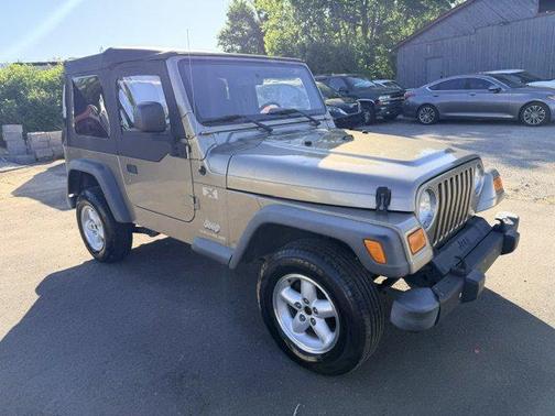 Tan 2004 Jeep Wrangler X